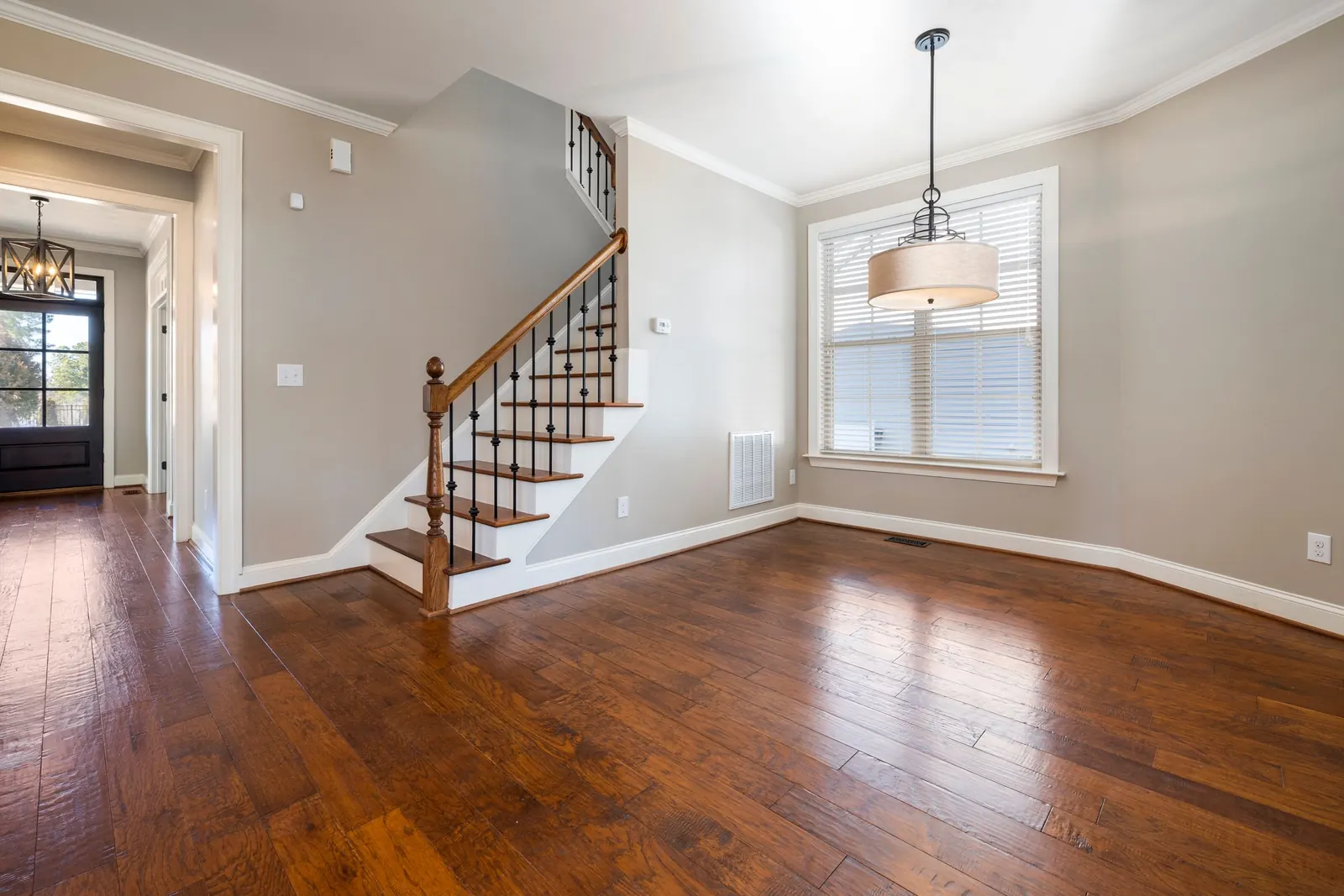 Hardwood entry leading to a staircase in Highland, CA
