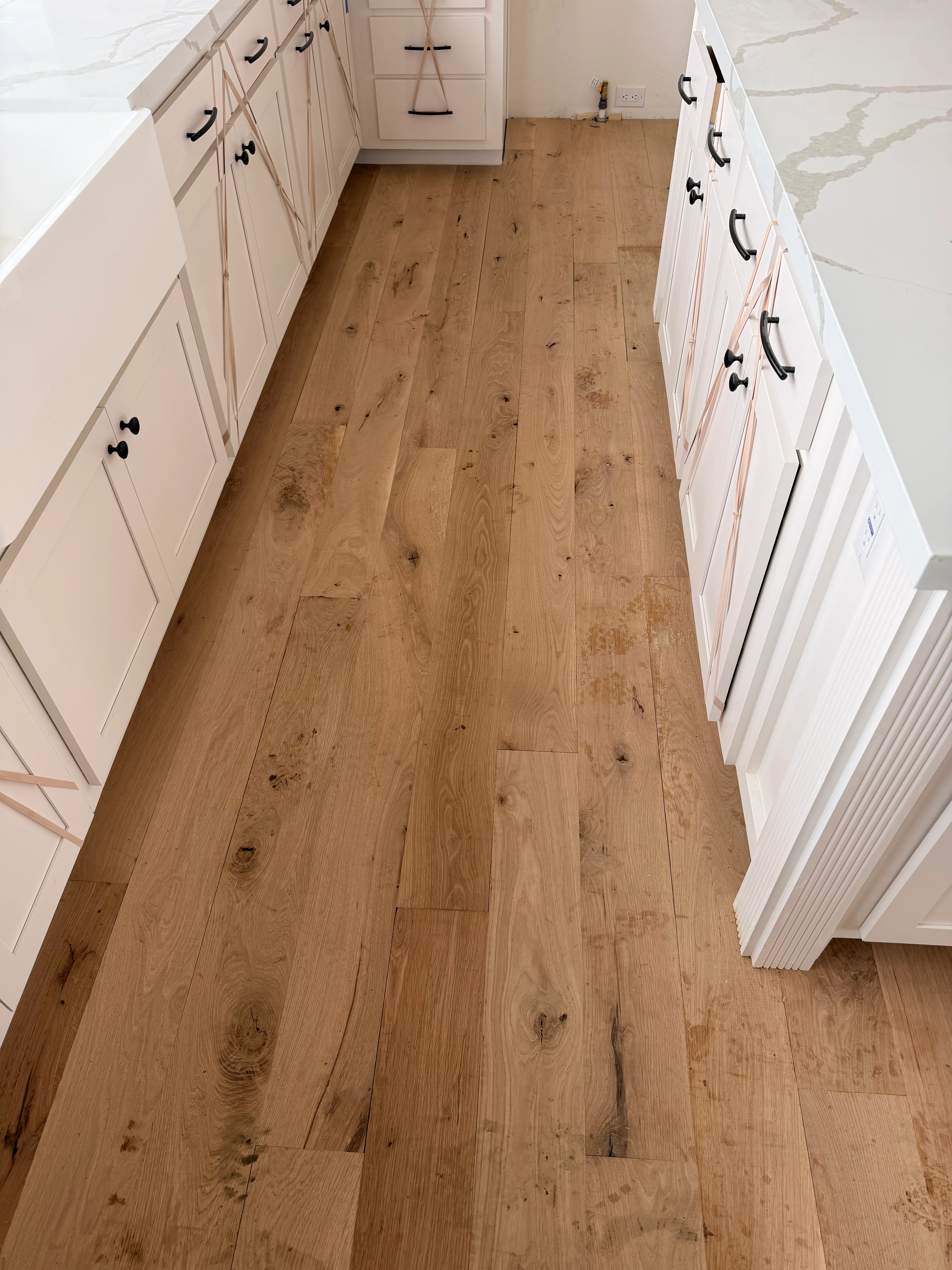 Well-maintained hardwood kitchen floor in an Inland Empire home