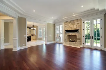 Hardwood floor with seamless board replacement across a large space