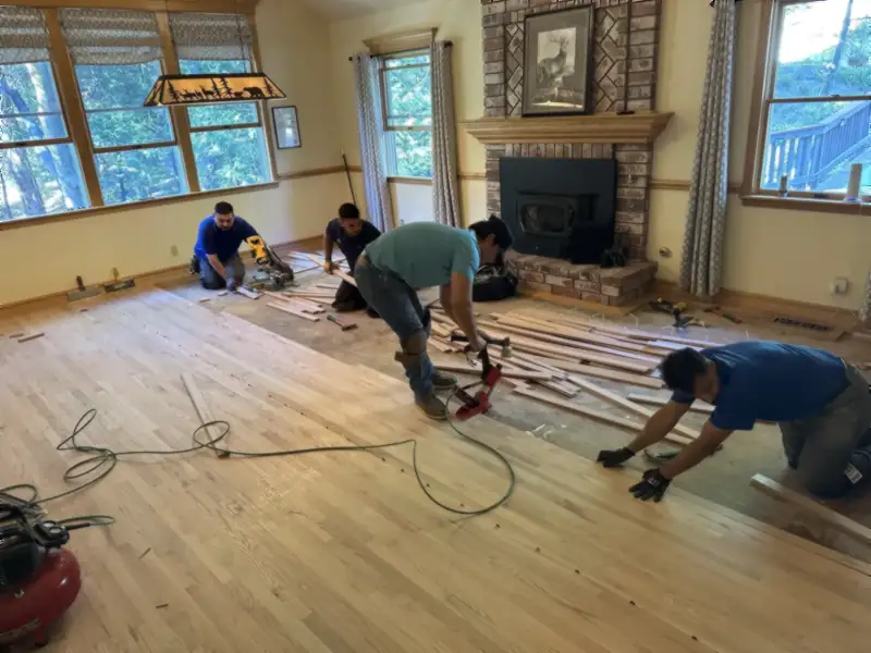 The Monteros crew installing hardwood