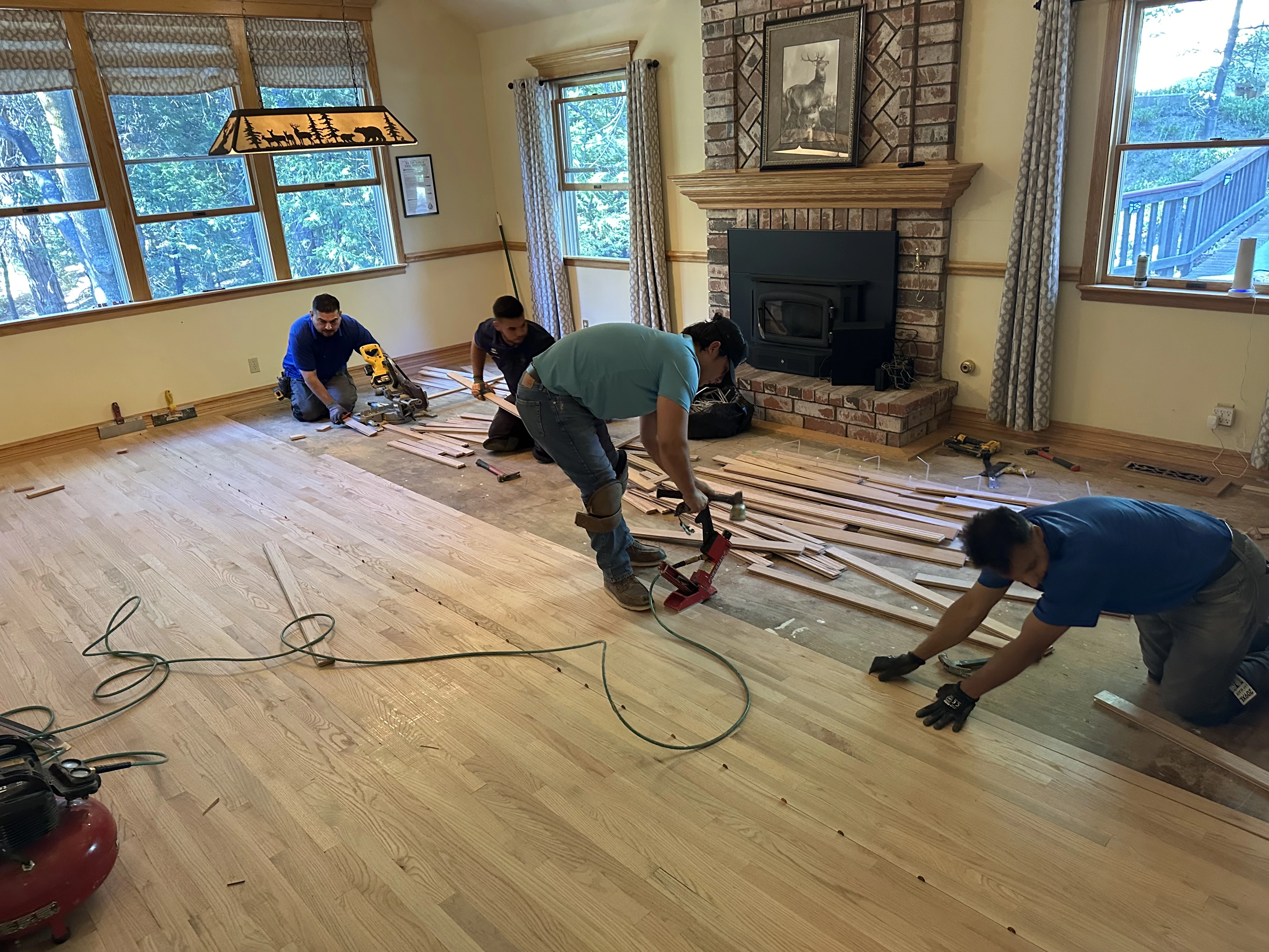 The Monteros Hardwood Flooring crew installing hardwood floors in an Inland Empire home